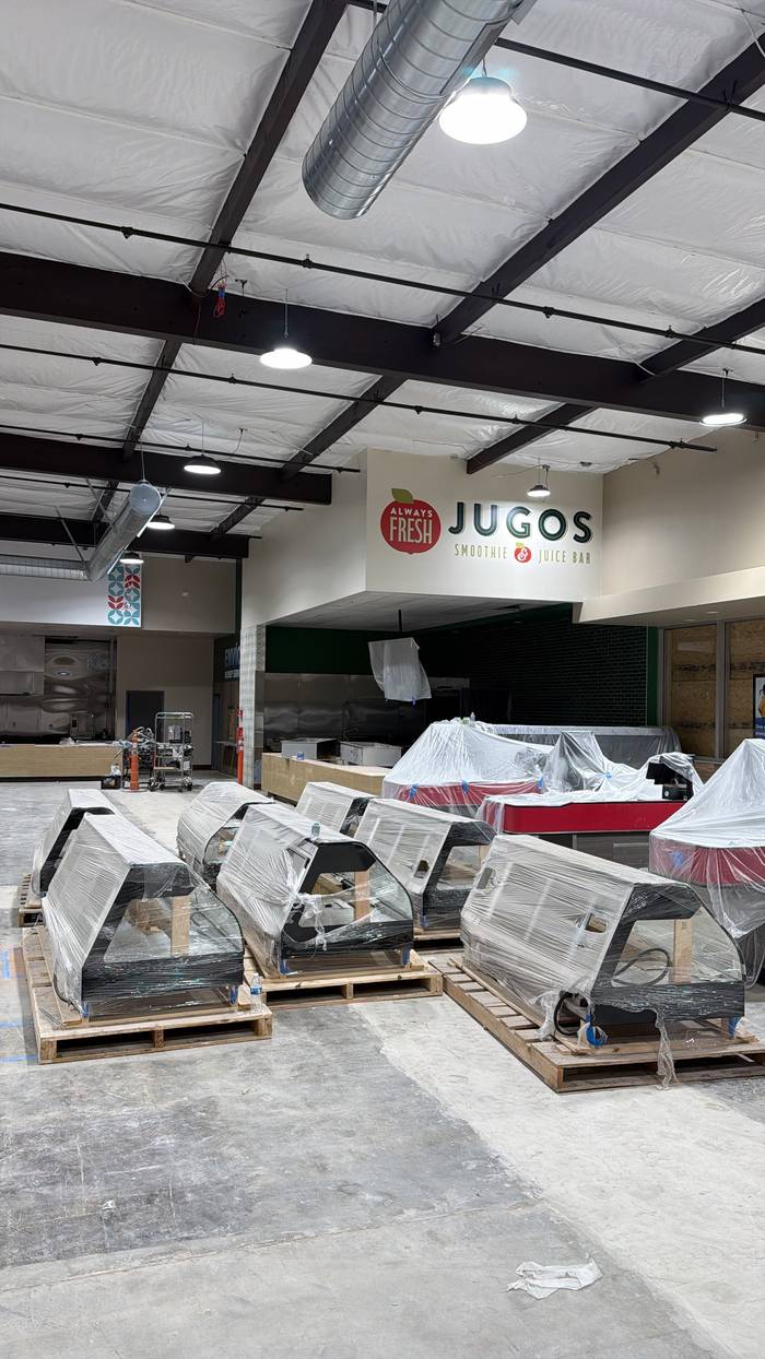Scissor-lift install of large-format graphics