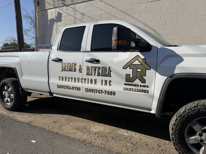 Jaime & Rivera Construction truck lettering